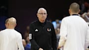 Feb 5, 2024; Charlottesville, Virginia, USA; Miami (Fl) Hurricanes head coach Jim Larranaga (center) looks on after the game against the Miami (Fl) Hurricanes at John Paul Jones Arena. Mandatory Credit: Amber Searls-Imagn Images