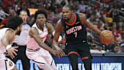 Nov 21, 2025; Houston, Texas, USA; Houston Rockets forward Kevin Durant (7) dribbles the ball as Denver Nuggets guard Peyton Watson (8) defends during the second quarter at Toyota Center. Mandatory Credit: Troy Taormina-Imagn Images