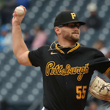 Apr 6, 2025; Pittsburgh, Pennsylvania, USA;  Pittsburgh Pirates relief pitcher Chase Shugart (55) pitches against the New York Yankees during the ninth inning at PNC Park. Mandatory Credit: Charles LeClaire-Imagn Images
