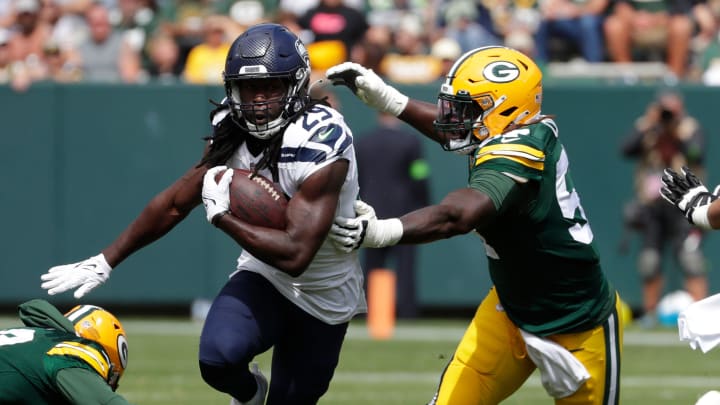 Seattle Seahawks running back SaRodorick Thompson Jr. (29) carries the ball down field against during their preseason football game Saturday, August 26, 2023, at Lambeau Field in Green Bay, Wis.