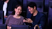 Dec. 8, 2024: Dodgers star Shohei Ohtani with his wife Mamiko Tanaka, at a Los Angeles Lakers game.