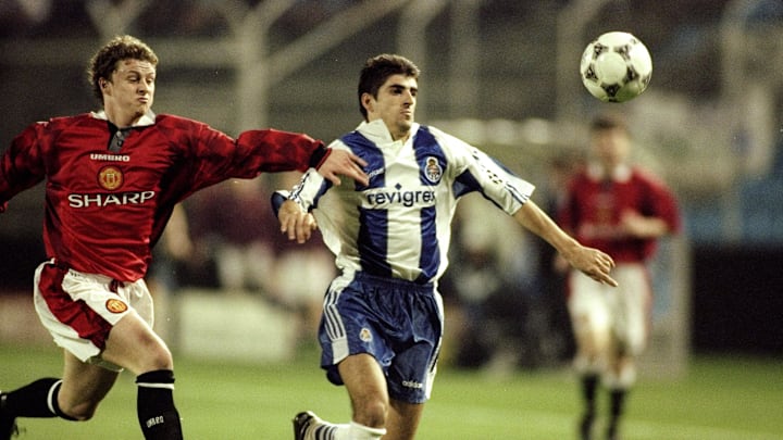 Paulinho Santos of Porto and Ole Gunnar Solskjaer of Manchester United