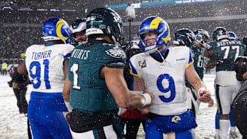 Jan 19, 2025; Philadelphia, Pennsylvania, USA; Philadelphia Eagles quarterback Jalen Hurts (1) and Los Angeles Rams quarterback Matthew Stafford (9) shake hands after a 2025 NFC divisional round game at Lincoln Financial Field. Mandatory Credit: Bill Streicher-Imagn Images