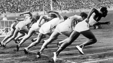Jesse Owens (right) starting the 100-meter sprint at the 1936 Olympic Games—which he would go on to win.