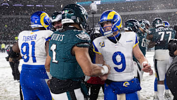 Jan 19, 2025; Philadelphia, Pennsylvania, USA; Philadelphia Eagles quarterback Jalen Hurts (1) and Los Angeles Rams quarterback Matthew Stafford (9) shake hands after a 2025 NFC divisional round game at Lincoln Financial Field. Mandatory Credit: Bill Streicher-Imagn Images