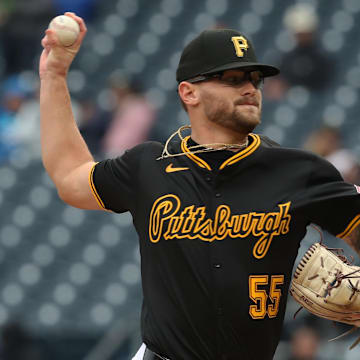 Apr 6, 2025; Pittsburgh, Pennsylvania, USA;  Pittsburgh Pirates relief pitcher Chase Shugart (55) pitches against the New York Yankees during the ninth inning at PNC Park. Mandatory Credit: Charles LeClaire-Imagn Images