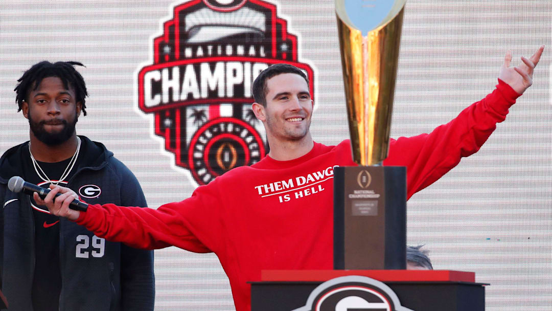 Georgia quarterback Stetson Bennett celebrates during Georgia's back to back National Championship celebration in Athens, Ga., on Saturday, Jan. 14, 2023.

Syndication Online Athens