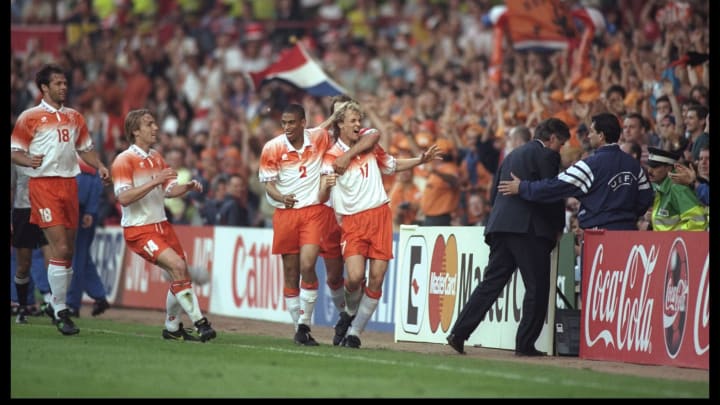 Holland's Jordi Cruyff (number 17) celebrates after scoring Holland's opening goal