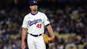 Jun 1, 2024; Los Angeles, California, USA;  Los Angeles Dodgers relief pitcher Blake Treinen (49) looks on during the eighth inning against the Colorado Rockies at Dodger Stadium. Mandatory Credit: Kiyoshi Mio-Imagn Images