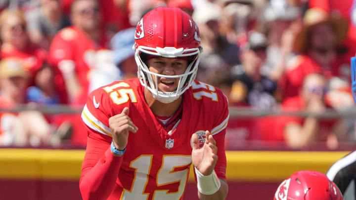 Aug 17, 2024; Kansas City, Missouri, USA; Kansas City Chiefs quarterback Patrick Mahomes (15) readies for the snap against the Detroit Lions during the game at GEHA Field at Arrowhead Stadium. Mandatory Credit: Denny Medley-USA TODAY Sports