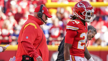 Oct 16, 2022; Kansas City, Missouri, USA; Kansas City Chiefs head coach Andy Reid walks with safety Justin Reid (20) to the sidelines against the Buffalo Bills after an injury timeout during the game at GEHA Field at Arrowhead Stadium. Mandatory Credit: Denny Medley-Imagn Images