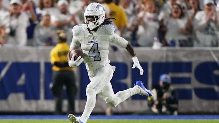 Oct 5, 2025; Orchard Park, New York, USA; Buffalo Bills running back James Cook (4) rushes the ball against the New England Patriots