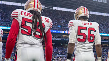 San Francisco 49ers linebacker De'Vondre Campbell (59) and defensive end Leonard Floyd (56)