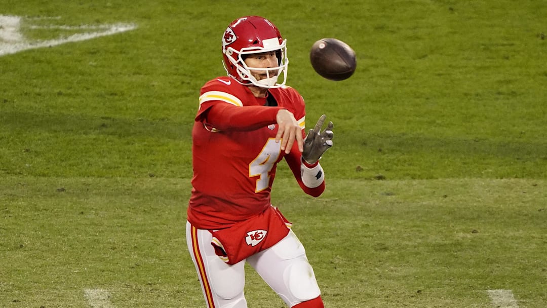 Jan 17, 2021; Kansas City, Missouri, USA; Kansas City Chiefs quarterback Chad Henne (4) throws against the Cleveland Browns during the second half in the AFC Divisional Round playoff game at Arrowhead Stadium. Mandatory Credit: Jay Biggerstaff-Imagn Images