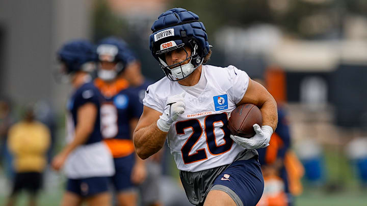 Jul 26, 2024; Englewood, CO, USA; Denver Broncos fullback Michael Burton (20) during training camp at Broncos Park Powered by CommonSpirit. 