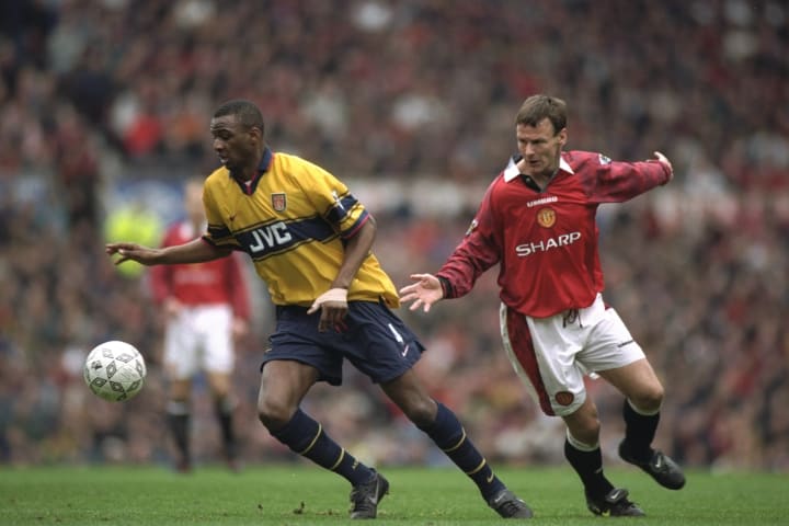 Patrick Vieira of Arsenal and Teddy Sheringham of Manchester United