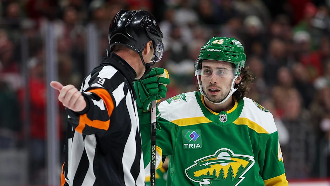 Jan 27, 2026; Saint Paul, Minnesota, USA; Minnesota Wild defenseman Quinn Hughes (43) talks with referee Dan O'Rourke (9) during overtime against the Chicago Blackhawks at Grand Casino Arena. Mandatory Credit: Matt Krohn-Imagn Images Jan 27, 2026; Saint Paul, Minnesota, USA; Minnesota Wild defenseman Quinn Hughes (43) talks with referee Dan O'Rourke (9) during overtime against the Chicago Blackhawks at Grand Casino Arena. Mandatory Credit: Matt Krohn-Imagn Images