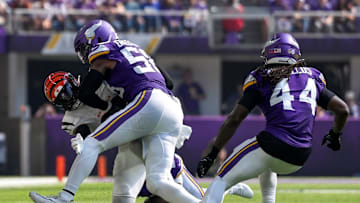 Cincinnati Bengals tight end Noah Fant (86) fumbles a catch to Minnesota Vikings cornerback Isaiah Rodgers (2) who runs the ball back for his second touchdown of the game in the second quarter of the NFL Week 3 game between the Minnesota Vikings and the Cincinnati Bengals at U.S. Bank Stadium in Minneapolis on Sunday, Sept. 21, 2025.