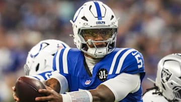 Oct 5, 2025; Indianapolis, Indiana, USA; Indianapolis Colts quarterback Anthony Richardson (5) hands off the ball during a game against the Las Vegas Raiders at Lucas Oil Stadium in Indianapolis at Lucas Oil Stadium. 