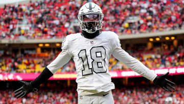 Dec 25, 2023; Kansas City, Missouri, USA; Las Vegas Raiders cornerback Jack Jones (18) interacts with the crowd after a play during the second half against the Kansas City Chiefs at GEHA Field at Arrowhead Stadium. Mandatory Credit: Jay Biggerstaff-USA TODAY Sports