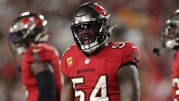 Jan 12, 2025; Tampa, Florida, USA; Tampa Bay Buccaneers linebacker Lavonte David (54) celebrates after a stop during the fourth quarter of a NFC wild card playoff against the Washington Commanders at Raymond James Stadium. Mandatory Credit: Nathan Ray Seebeck-Imagn Images