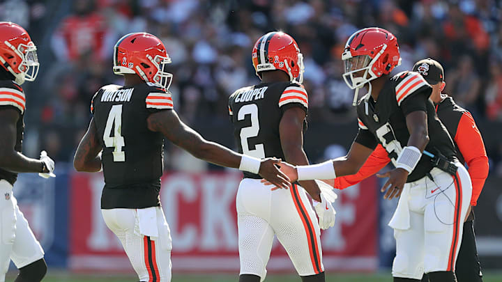 Cleveland Browns backup quarterback Jameis Winston, right, welcomes quarterback Deshaun Watson (4), wide receiver Jerry Jeudy (3) and wide receiver Amari Cooper (2) off the field during the first half of an NFL football game at Huntington Bank Field, Sunday, Sept. 8, 2024, in Cleveland, Ohio.