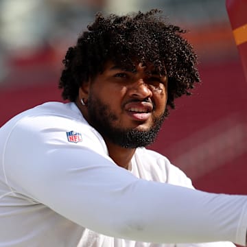 Tampa Bay Buccaneers offensive tackle Tristan Wirfs warms up before a game against the Atlanta Falcons.