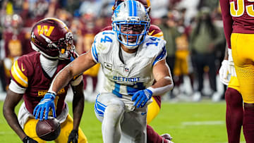 Detroit Lions wide receiver Amon-Ra St. Brown (14) celebrates a touchdown against the Washington Commanders during the first half at Northwest Stadium in Landover, Md., on Sunday, November 9, 2025.
