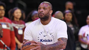 Mar 22, 2025; New York, New York, USA; New York Knicks forward P.J. Tucker (17) warms up before the game against the Washington Wizards at Madison Square Garden. Mandatory Credit: Vincent Carchietta-Imagn Images