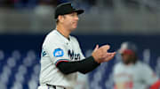 Sep 8, 2025; Miami, Florida, USA; Miami Marlins manager Clayton McCullough (86) walks toward the mound for a pitching change against the Washington Nationals during the fifth inning at loanDepot Park. 