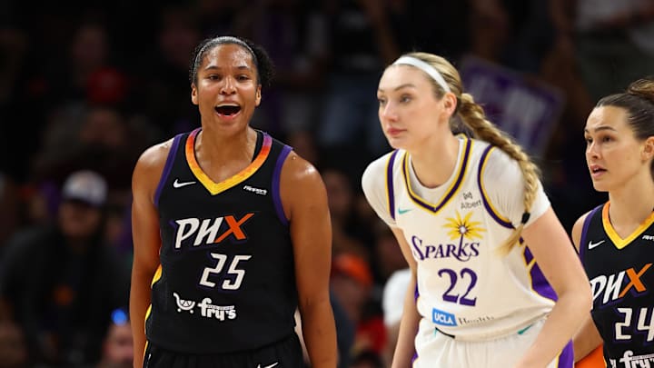Sep 9, 2025; Phoenix, Arizona, USA; Phoenix Mercury forward Alyssa Thomas (25) reacts towards Los Angeles Sparks forward Cameron Brink (22) during the second half of a WNBA game at PHX Arena. Mandatory Credit: Mark J. Rebilas-Imagn Images