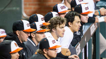 Oregon State players watch their team compete against San Diego during an NCAA college baseball game at Goss Stadium on Friday, March 7, 2025, in Corvallis, Ore.
