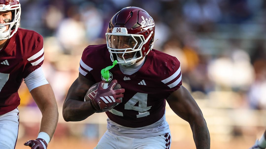 Mississippi State Bulldogs running back Fluff Bothwell (24) runs with the ball against the Alcorn State Braves during the first half at Davis Wade Stadium at Scott Field in Starkville, Miss.