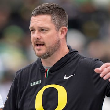 Oregon coach Dan Lanning greets Fighting Ducks running back Jayden Limar before the game as the Fighting Ducks face off against Mighty Oregon in the Oregon Ducks spring game on April 26, 2025, at Autzen Stadium in Eugene.