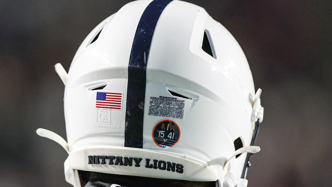 Nov 19, 2022; Piscataway, New Jersey, USA; A Penn State Nittany Lions helmet is seen with a sticker honoring the Virginia football players who were victims of a shooting on the University of Virginia campus, on November thirteenth 2022, during the second half against the Rutgers Scarlet Knights at SHI Stadium. 