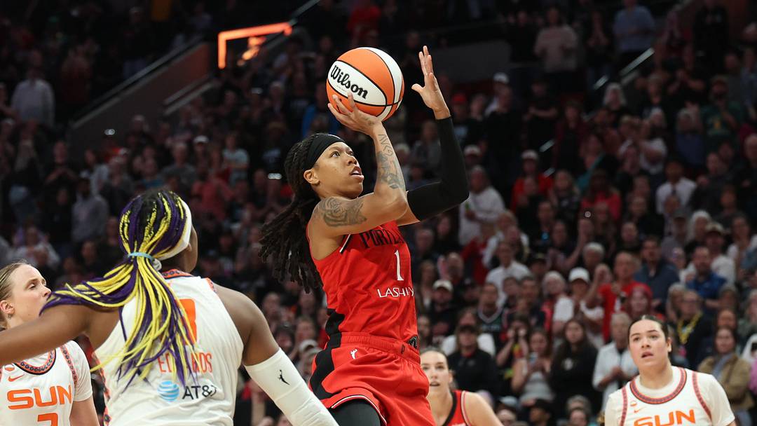 May 18, 2026; Portland, Oregon, USA; Portland Fire guard Sug Sutton (1) shoots the ball against the Connecticut Sun in the second half at Moda Center. Mandatory Credit: Jaime Valdez-Imagn Images