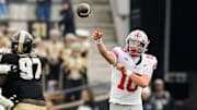 Ohio State Buckeyes quarterback Julian Sayin (10) throws over Purdue Boilermakers defensive lineman Jamarrion Harkless (97) during the NCAA football game at Ross-Ade Stadium in West Lafayette, Ind. on Nov. 8, 2025. Ohio State won 34-10.