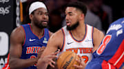 Jan 13, 2025; New York, New York, USA; New York Knicks center Karl-Anthony Towns (32) controls the ball against Detroit Pistons center Isaiah Stewart (28) during the third quarter at Madison Square Garden. Mandatory Credit: Brad Penner-Imagn Images