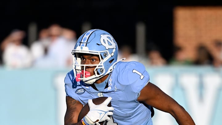 Sep 7, 2024; Chapel Hill, North Carolina, USA; North Carolina Tar Heels wide receiver Jordan Shipp (1)  with the ball in the fourth quarter at Kenan Memorial Stadium. Mandatory Credit: Bob Donnan-Imagn Images