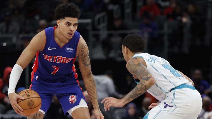 Jan 24, 2024; Detroit, Michigan, USA;  Detroit Pistons guard Killian Hayes (7) dribbles defended by Charlotte Hornets guard Nick Smith Jr. (8) in the first half at Little Caesars Arena. Mandatory Credit: Rick Osentoski-USA TODAY Sports