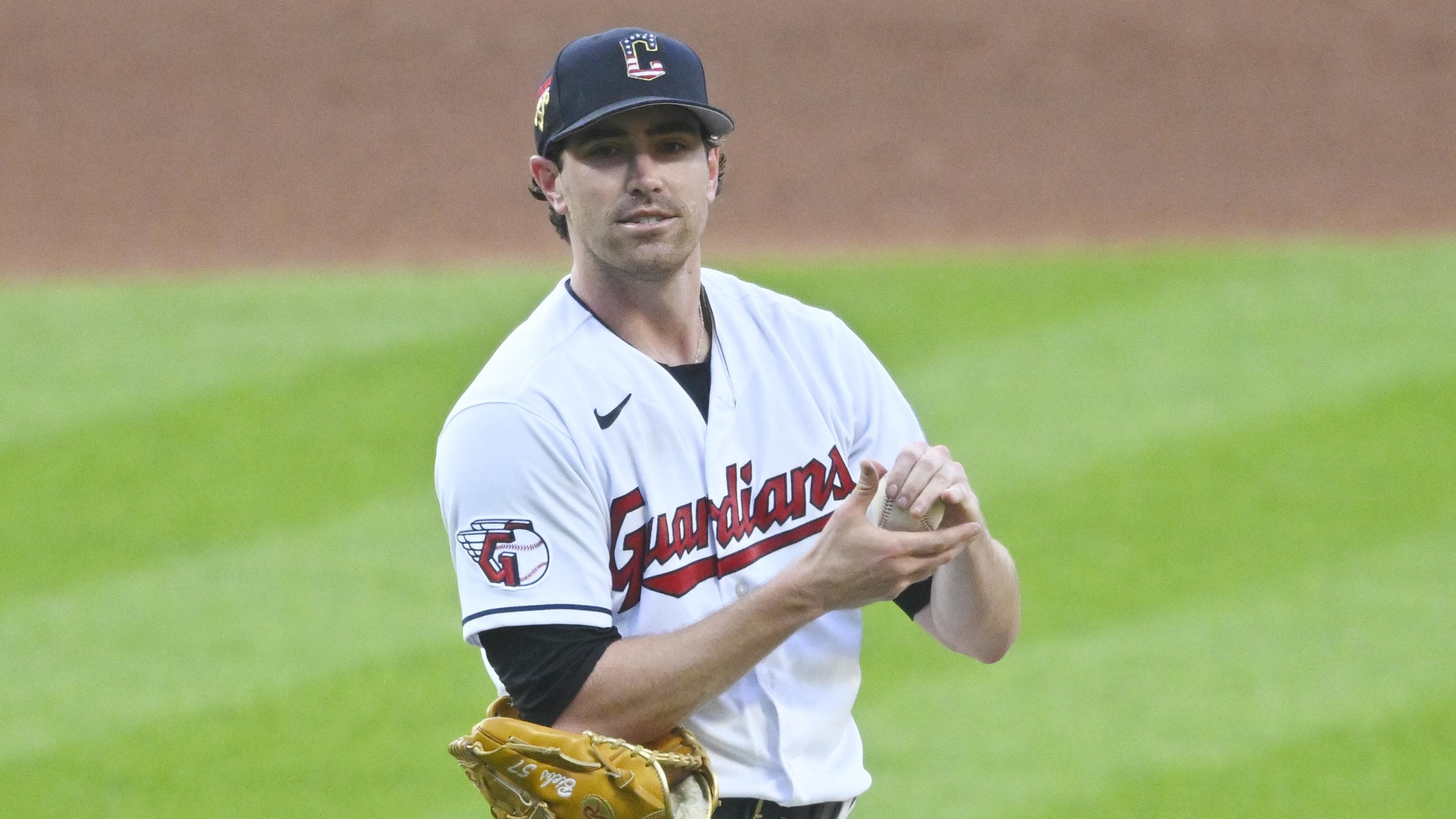 Jul 4, 2023; Cleveland, Ohio, USA; Cleveland Guardians starting pitcher Shane Bieber (57) reacts on the mound.