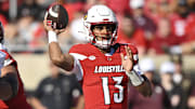 Aug 30, 2025; Louisville, Kentucky, USA;  Louisville Cardinals quarterback Deuce Adams (13) looks to pass against the Eastern Kentucky Colonels during the second half at L&N Federal Credit Union Stadium. Louisville defeated Eastern Kentucky 51-17. Mandatory Credit: Jamie Rhodes-Imagn Images