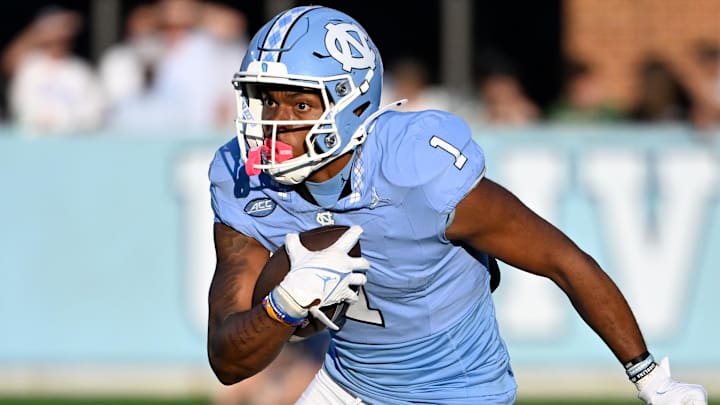 Sep 7, 2024; Chapel Hill, North Carolina, USA; North Carolina Tar Heels wide receiver Jordan Shipp (1)  with the ball in the fourth quarter at Kenan Memorial Stadium. Mandatory Credit: Bob Donnan-Imagn Images