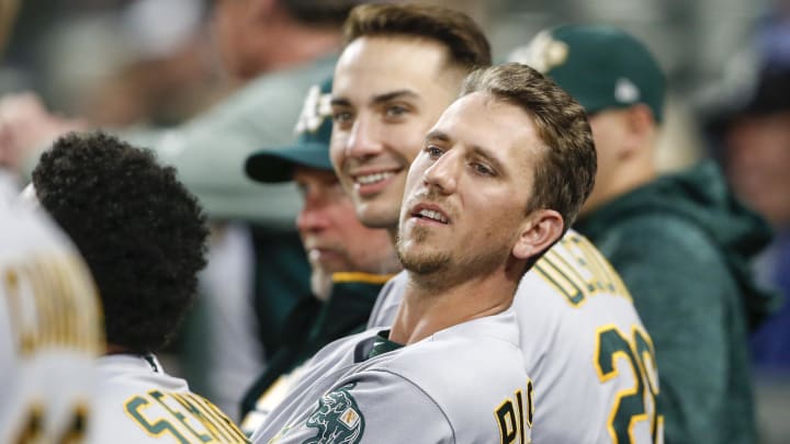 Sep 24, 2018; Seattle, WA, USA; Oakland Athletics right fielder Stephen Piscotty (25) and first