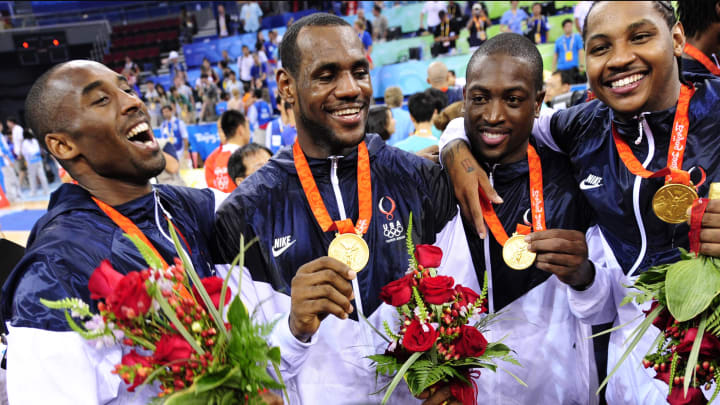 Aug. 24, 2008; Beijing, CHINA; United States guards Kobe Bryant and Lebron James and Dwyane Wade and forward Carmelo Anthony celebrate after the United States 118-107 victory against Spain in the gold medal game at the Beijing Olympic Basketball Stadium in the 2008 Beijing Olympics. Mandatory Credit: Bob Donnan-USA TODAY Sports