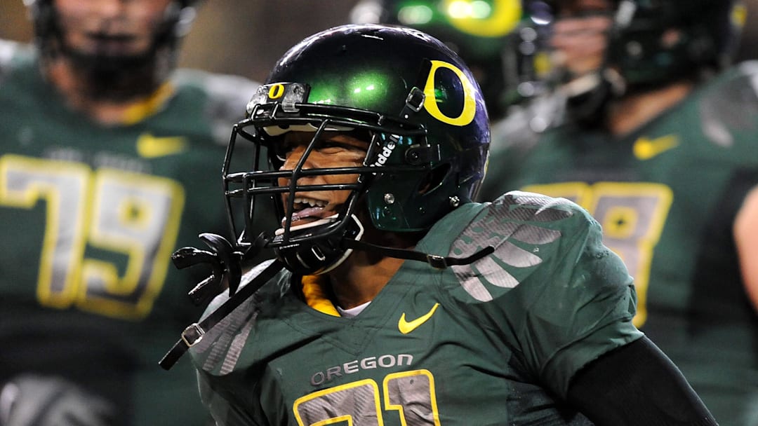 Oct 31, 2009; Eugene, OR, USA; Oregon Ducks running back LaMichael James (21) reacts after scoring on a 5-yard touchdown run in the third quarter against the Southern California Trojans at Autzen Stadium. Oregon defeated USC 47-20. Mandatory Credit: Kirby Lee/Image of Sport-Imagn Images