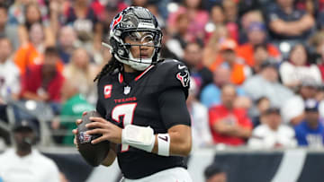 Nov 2, 2025; Houston, Texas, USA; Houston Texans quarterback C.J. Stroud (7) drops to throw during the first half against the Denver Broncos at NRG Stadium. Mandatory Credit: Sean Thomas-Imagn Images