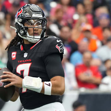 Nov 2, 2025; Houston, Texas, USA; Houston Texans quarterback C.J. Stroud (7) drops to throw during the first half against the Denver Broncos at NRG Stadium. Mandatory Credit: Sean Thomas-Imagn Images