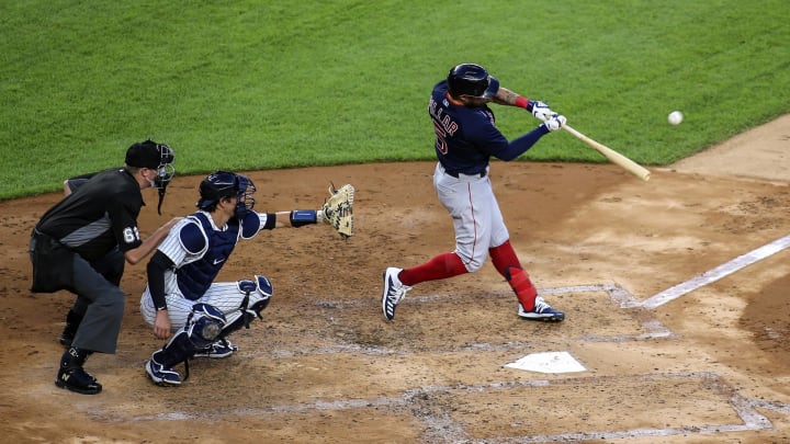 Jul 31, 2020; Bronx, New York, USA;  Boston Red Sox right fielder Kevin Pillar (23) hits a single in the third inning against the New York Yankees at Yankee Stadium. Mandatory Credit: Wendell Cruz-USA TODAY Sports