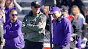 Nov 6, 2021; Lawrence, Kansas, USA; Kansas Jayhawks head coach Lance Leipold (left) talks with Kansas State Wildcats head coach Chris Klieman during an injury time out during the first half at David Booth Kansas Memorial Stadium. Mandatory Credit: Denny Medley-Imagn Images